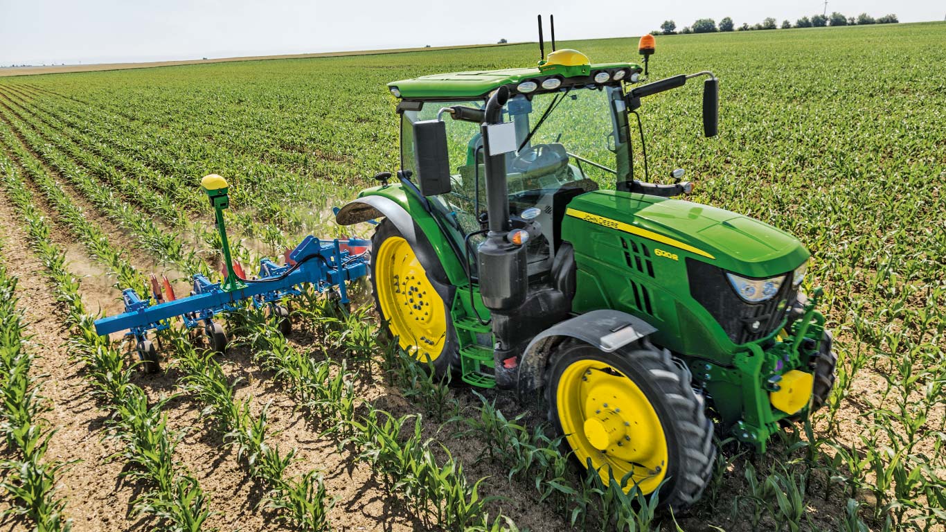 In de tractor geïntegreerde John Deere Active Implement Guidance™