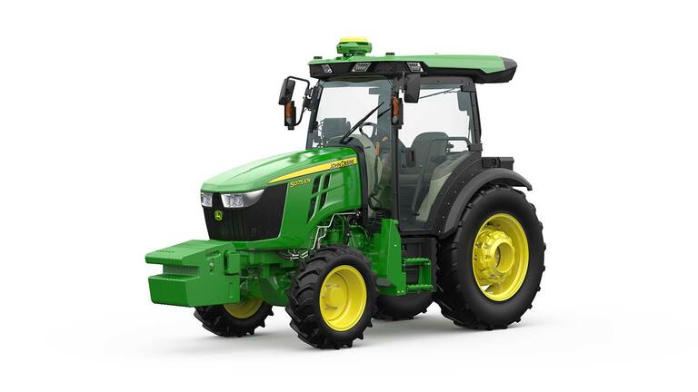 Tracteur John Deere 5075EN vert et jaune, vue avant mettant en valeur son design compact et ses pneus robustes.