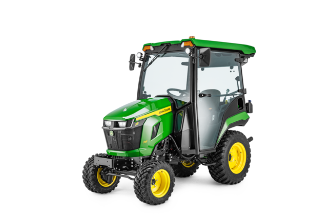 Tracteur compact John Deere 1R avec cabine fermée, photographié seul sur fond blanc